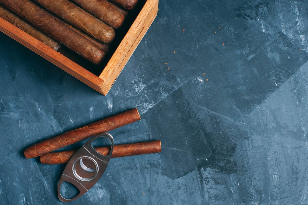 Cigars, Guillotine cuts off the cigar tip, Wooden box, cigars.